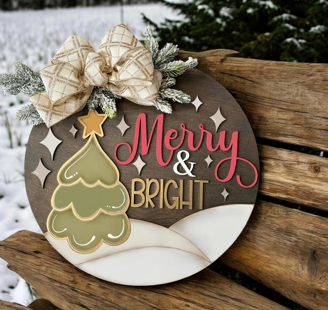 Decorative Christmas sign with 'Merry & Bright' text and festive elements on a wooden background.